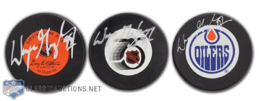 Wayne Gretzky Autographed Puck Collection of 3