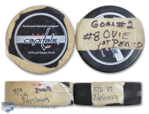 Alexander Ovechkins 2009 NHL PLayoffs Goal Puck Collection of 2