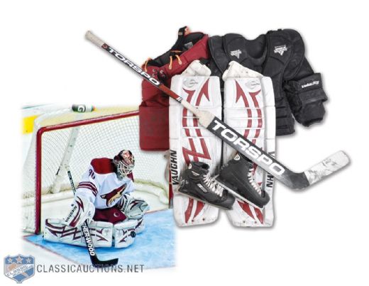 Ilya Bryzgalovs Phoenix Coyotes Game-Worn Goalie Pads and Equipment Collection