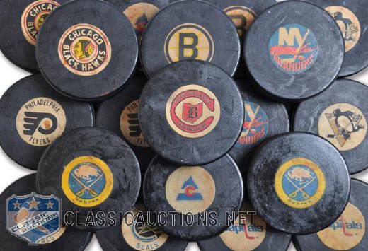 Dennis Polonichs 1969-77 Art Ross and Converse Game Puck Collection of 19