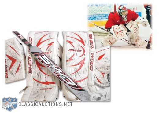 Kim St-Pierres 2010 Olympics Signed Game-Used Blocker, Trapper and Photo-Matched Pads + <br>Game-Used Stick