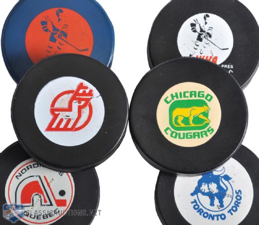 WHA Puck Collection of 6 with 1972 Biltrite Blue Slug