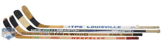 Gary Roberts, Alexander Mogilnys, Owen Nolans and Jason Arnotts Game-Used Sticks