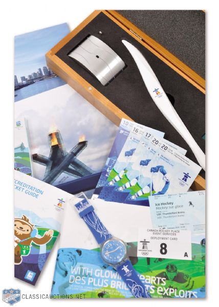 Vancouver 2010 Winter Olympics Torch Replica, Swatch Watch, Commemorative Book and More (19 Pieces)