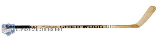 Paul Coffeys 1980s Edmonton Oilers Game-Used Sher-Wood Stick