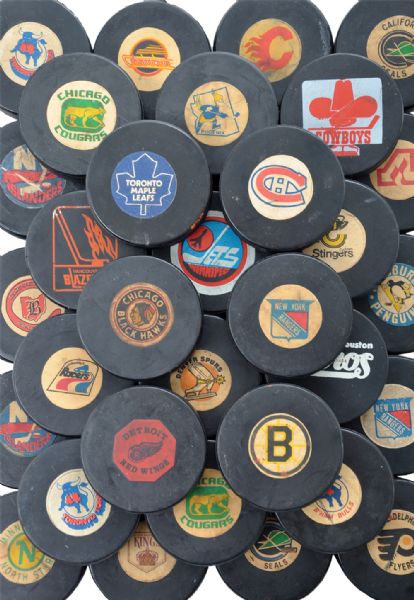 Bob Sicinskis NHL, WHA and Minor Game Puck Collection of 74
