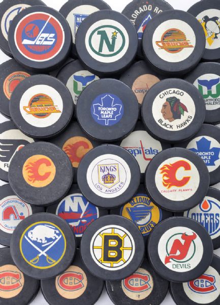 Dr. John Finleys 1973-84 Viceroy Official Game Puck Collection of 32 Plus 102 Others