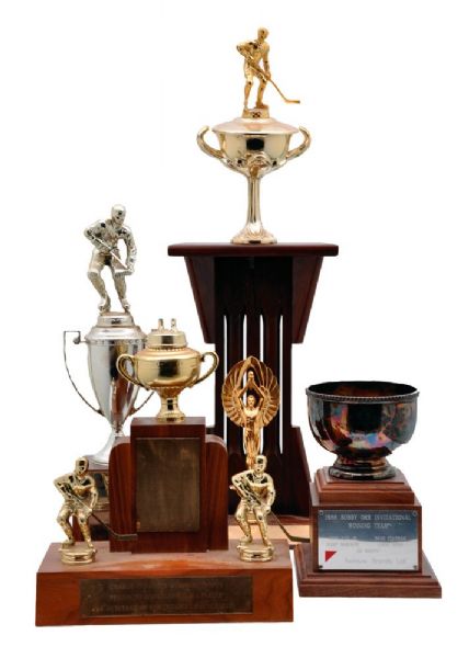 Gary Bergmans Career Trophy Collection of 7 Including Red Wings, KC Scouts, Winnipeg Braves and Charlie Conacher Memorial Trophies with Family LOA