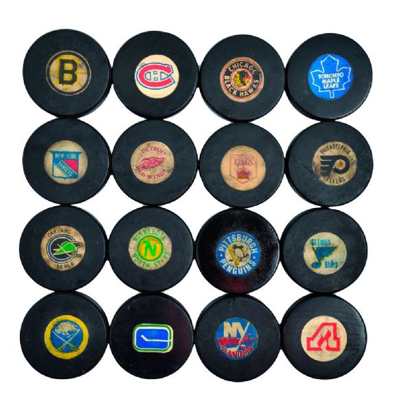 1973-74 NHL Goal Puck Program Complete 16 Team Collection Including Bucyk, Ratelle and Barber Goal Pucks
