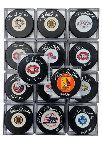Past and Present Goalies Single-Signed Puck Collection of 26 with Roy and Hasek with COAs