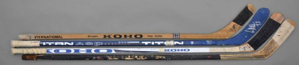 Game-Used Stick Collection of 4 with Marcel Dionne and Doug Gilmour