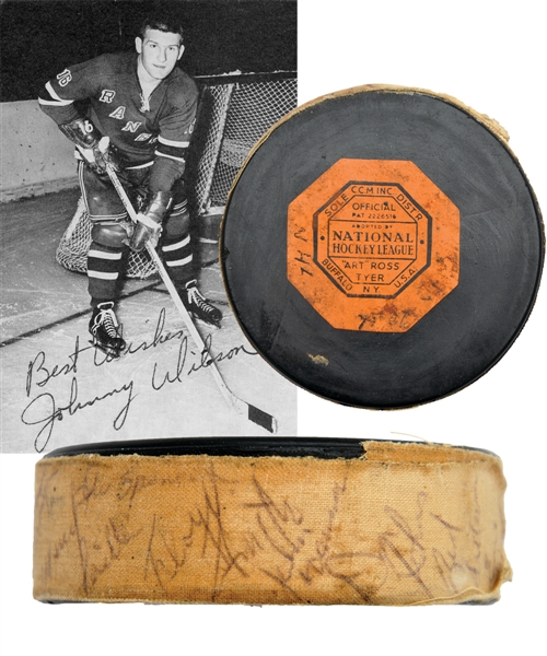 Johnny Wilsons 1960-61 New York Rangers Team-Signed Puck with LOA from Family and JSA LOA