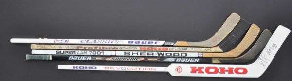 Collection of 5 Signed and Multi-Signed Hockey Sticks Including Patrick Roy, Quintal Canadiens Team-Signed and Others