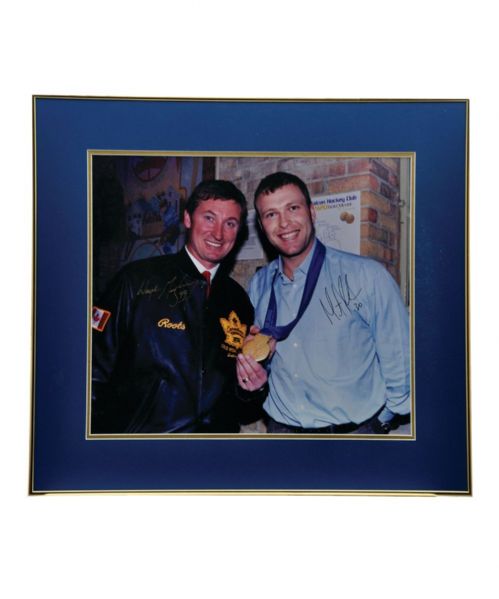 Wayne Gretzky and Martin Brodeur Dual-Signed 2002 Winter Olympics Framed Photo (22" x 24")
