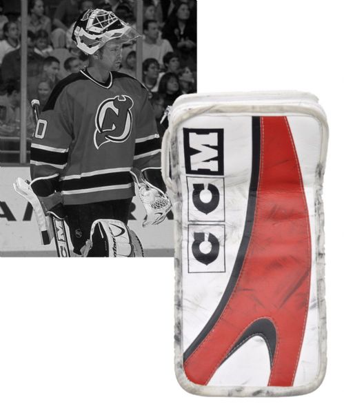 Martin Brodeurs 2001-02 New Jersey Devils Signed CCM Game-Worn Blocker - Photo-Matched!