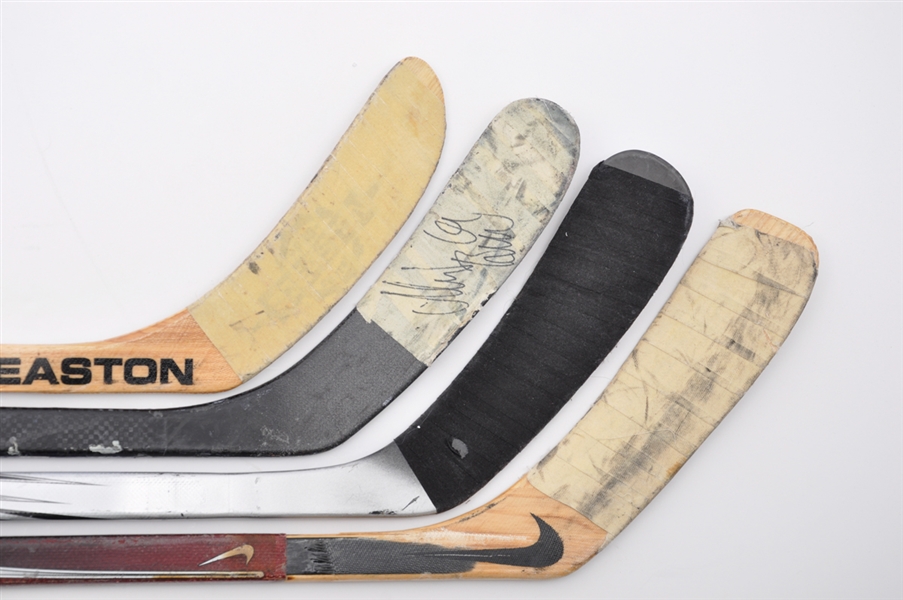 Lecavaliers Lightning, Backstroms Capitals, Bures Flames and Malones Lightning Game-Used Sticks