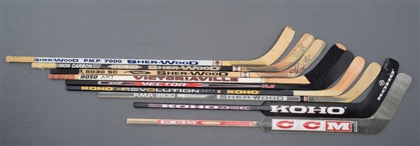 Game-Used, Game-Issued and Other Hockey Stick Collection of 9 with Bourque, Coffey and MacInnis Game-Used Sticks