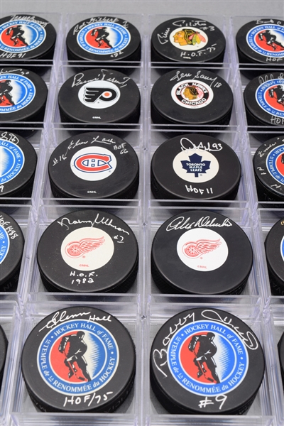 Hockey HOFers Signed Puck Collection of 20 with Lindsay, Hall and Other Greats