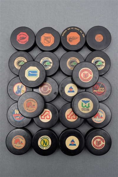 Converse, Viceroy and Other NHL Game Puck Collection of 24 with "Original Six" Red Wings and Rangers
