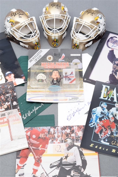Ed Belfours Signed Dallas Stars Photos, Mini Masks, Figurine and Jersey Number Collection of 42