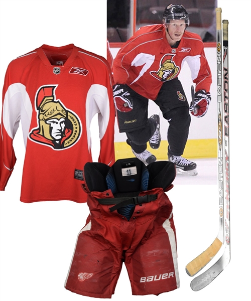 Daniel Alfredssons 2009-10 Ottawa Senators Practice-Worn Jersey with LOA, Game-Used Sticks (2) and 2013-14 Red Wings Photo-Matched Pants with COA