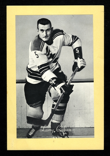 Larry Cahan (Name on Right Skate) New York Rangers Bee Hive Group 2 Photo (1945-64)
