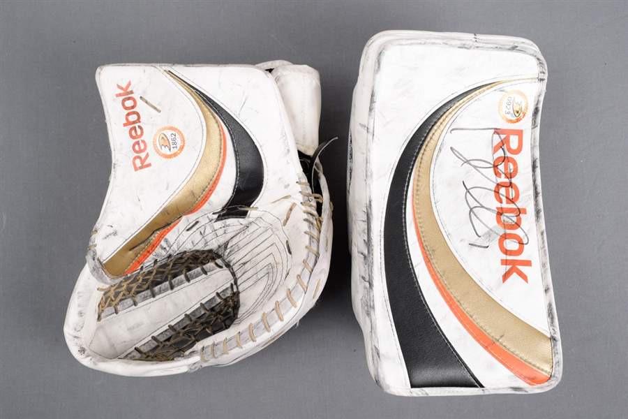 Jonas Hillers 2008-09 Anaheim Ducks Signed Reebok Game-Used Glove and Blocker - Photo-Matched!
