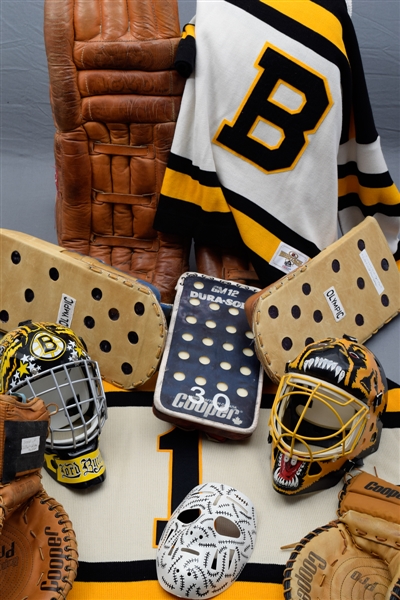 Boston Bruins "Man Cave" Collection of 9 with Goalie Masks, Jerseys and Equipment