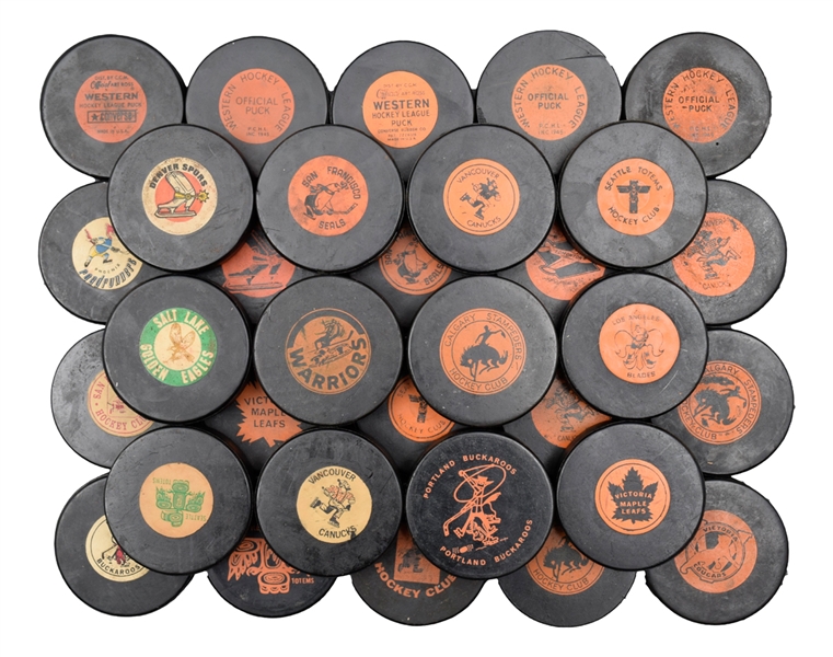 Vintage 1954-74 WHL / Western Hockey League Game Puck Collection of 74