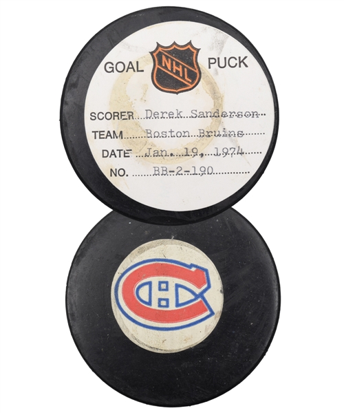 Derek Sandersons Boston Bruins January 19th 1974 Goal Puck from the NHL Goal Puck Program - 8th Goal of Season / Career Goal #135