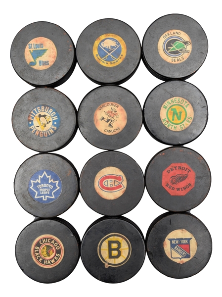 Converse and Viceroy NHL Game Puck Collection of 11 Plus WHL Canucks Converse Game Puck