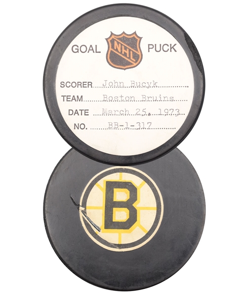 Johnny Bucyk’s Boston Bruins March 25th 1973 Goal Puck from the NHL Goal Puck Program - 40th Goal of Season / Career Goal #435