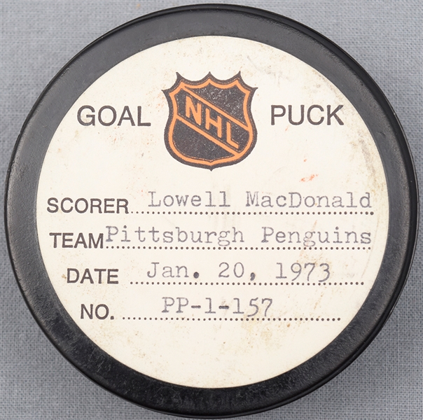 Lowell MacDonald’s Pittsburgh Penguins January 20th 1973 Goal Puck from the NHL Goal Puck Program - 20th Goal of Season / Career Goal #60