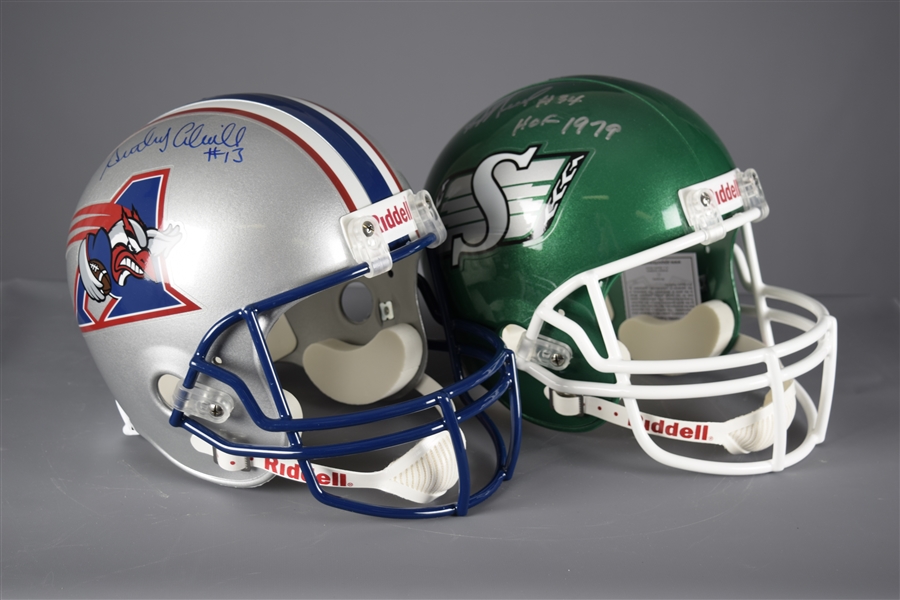 Anthony Calvillo (Alouettes) and George Reed (Roughriders) Signed Full-Size Riddell Helmets with COAs