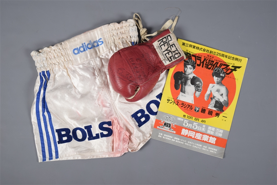 Santos Laciars Early-1980s Fight-Worn Trunks and Signed Fight Glove