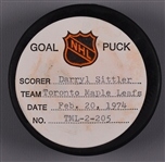 Darryl Sittlers Toronto Maple Leafs February 20th 1974 Goal Puck from the NHL Goal Puck Program - 30th Goal of Season / Career Goal #84