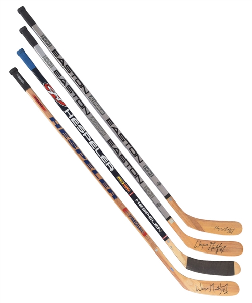 Wayne Gretzky’s 1990’s Game Stick Collection of 4 Including 3 Signed Sticks