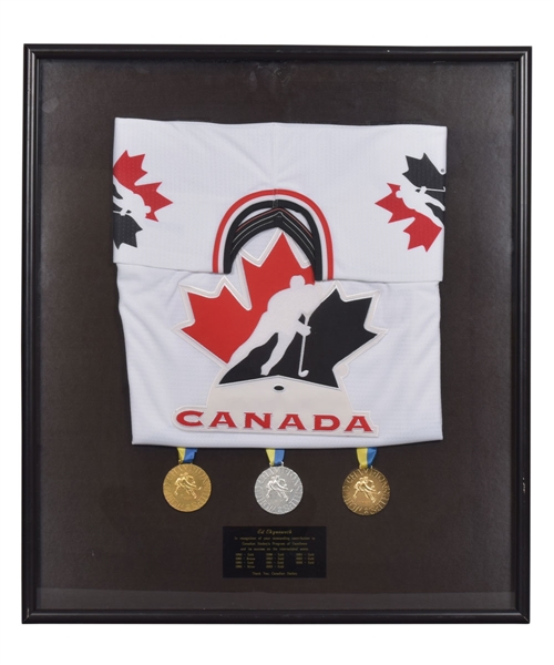 Ed Chynoweths 1996 World Junior Championships Team Canada Commemorative Frame with Gold, Silver and Bronze Medals