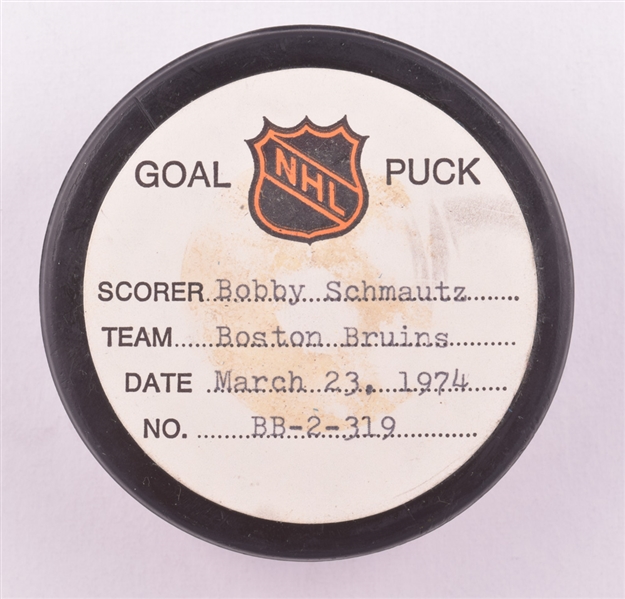 Bobby Schmautzs Boston Bruins March 23rd 1974 Goal Puck from the NHL Goal Puck Program - 30th Goal of Season / Career Goal #97