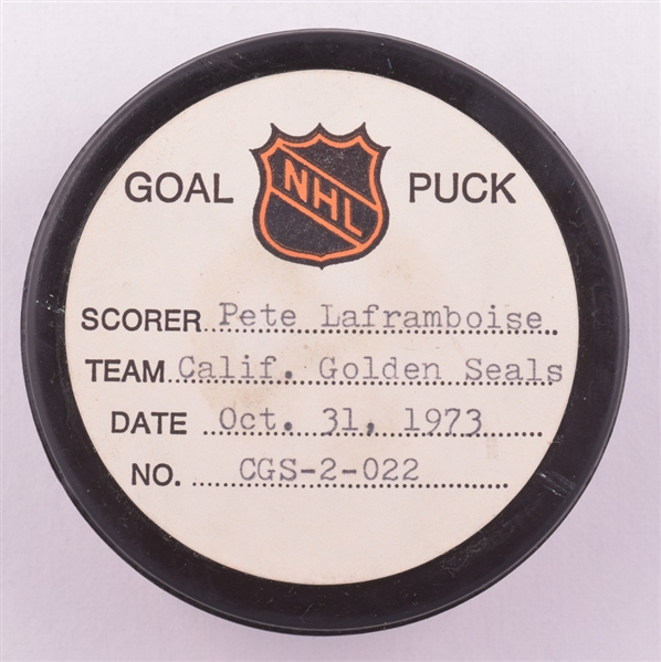 Pete Laframboises California Golden Seals October 31st 1973 Goal Puck from the NHL Goal Puck Program - 1st Goal of Season / Career Goal #17