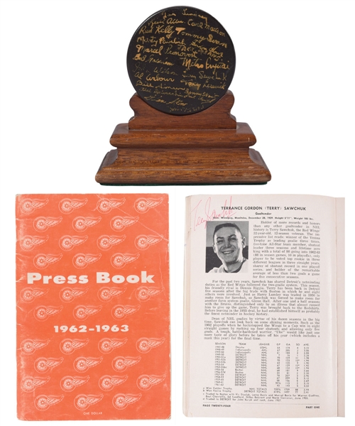 Detroit Red Wings 1953-54 Stanley Cup Champions Team-Signed Puck by 21 with PSA/DNA LOA Plus 1962-63 Team-Signed Media Guide - Both Including Sawchuk and Howe!