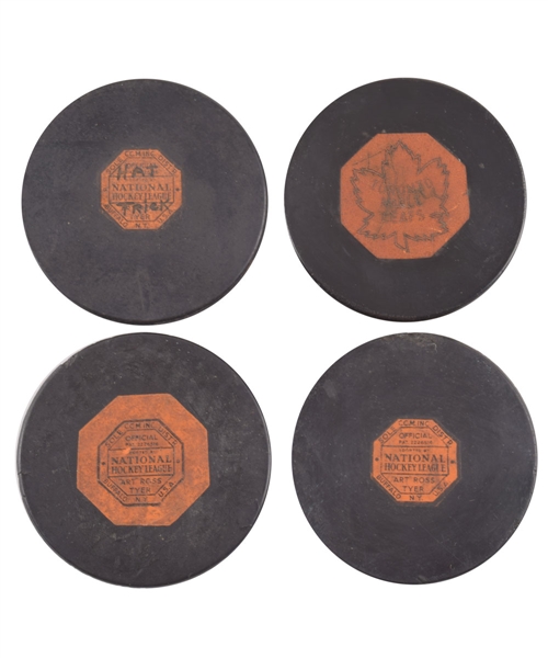 Tod Sloans NHL Game Puck Collection of 4 Including 1951 "Hat Trick" Art Ross Game Puck and Early-1960s Maple Leafs "Original Six" Art Ross Game Puck with Family LOA