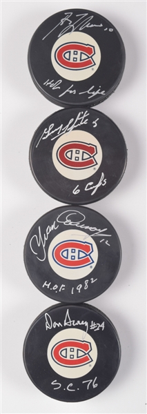 Montreal Canadiens 1976 Stanley Cup Champions Signed Puck Collection of 13 with Hall of Fame Members Lafleur, Shutt, Savard, Cournoyer, Lapointe, Bowman and Robinson with LOA