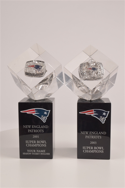 New England Patriots 2001 and 2003 Super Bowl Championship Rings in Lucite Cubes with Display Stands