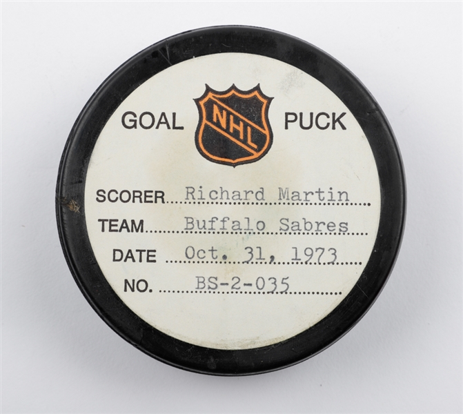 Richard Martins Buffalo Sabres October 31st 1973 Goal Puck from the NHL Goal Puck Program - 9th Goal of Season / Career Goal #90 of 384 - 2nd Goal of Natural Hat Trick