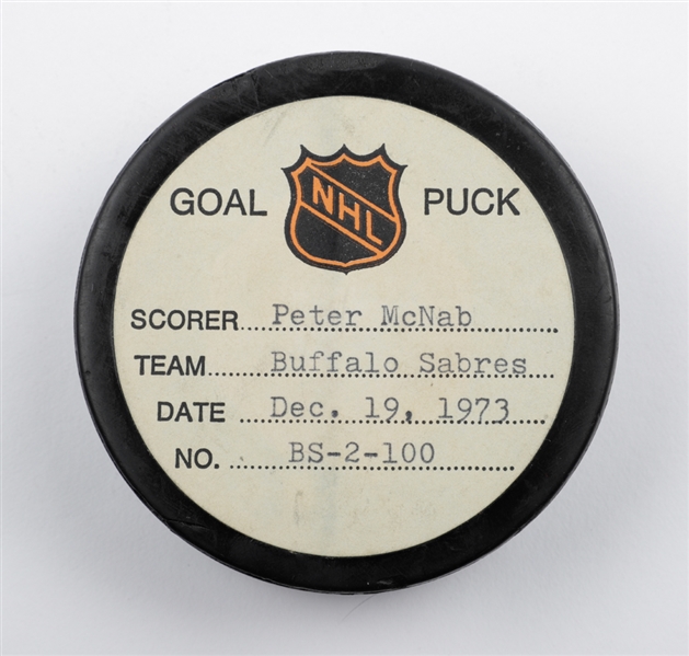 Peter McNabs Buffalo Sabres December 19th 1973 Goal Puck from the NHL Goal Puck Program - 2nd Goal of Rookie Season / Career Goal #2 of 363 - Buffalo Sabres 100th Goal of the Season