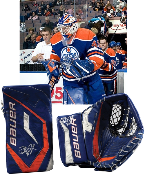 Devan Dubnyks 2009-10 Edmonton Oilers Signed Bauer Game-Used "Retro Colors" Glove and Blocker from Rookie Season with Team LOA - Both Photo-Matched!