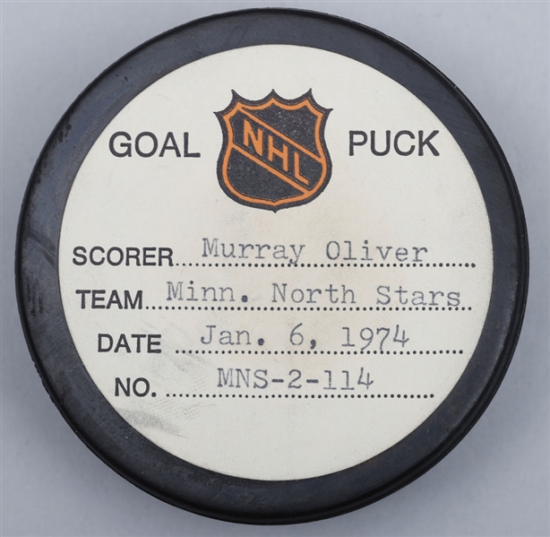 Murray Olivers Minnesota North Stars January 6th 1974 Goal Puck from the NHL Goal Puck Program - 7th Goal of Season / Career Goal #245 of 274