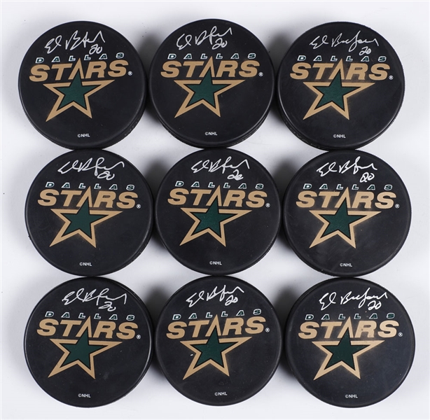 Ed Belfours Dallas Stars Signed Pucks (63) and Panoramic Posters (16) with His Signed LOA