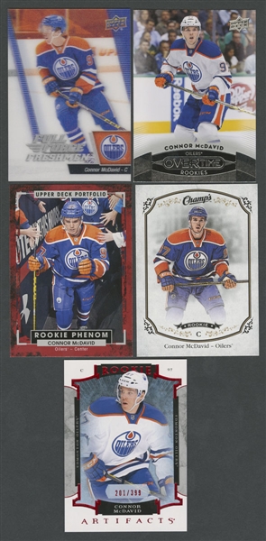2015-16 Upper Deck Rookie Artifacts Hockey Card #205 Connor McDavid Ruby Red #201/399 Plus Rookie Phenom #250, Overtime Rookies #180, Full Force Freshman #101 and Champs RC #315